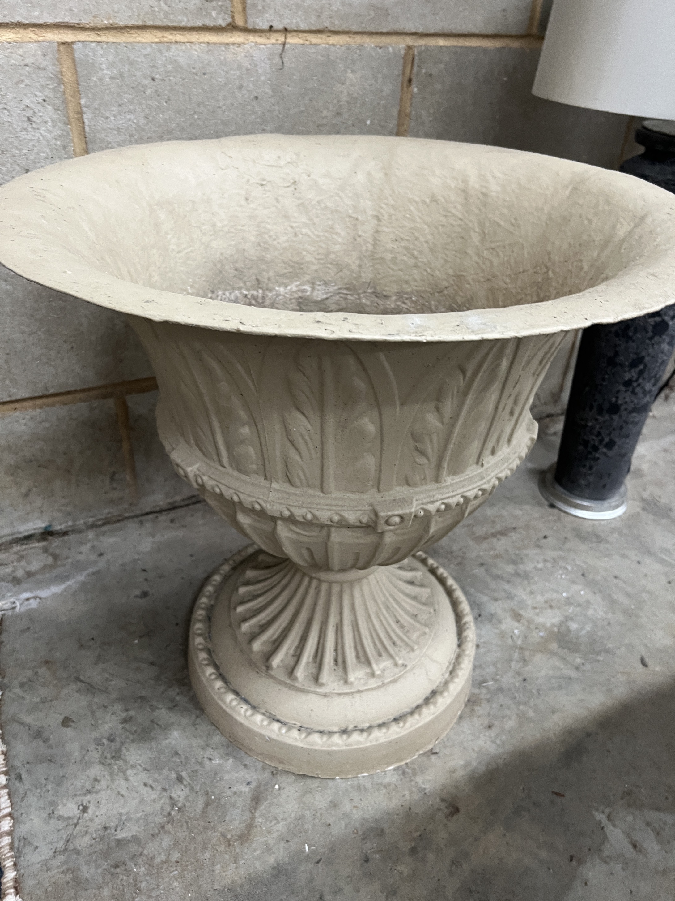 A pair of composition faux stone circular garden planters, diameter 62cm, height 60cm